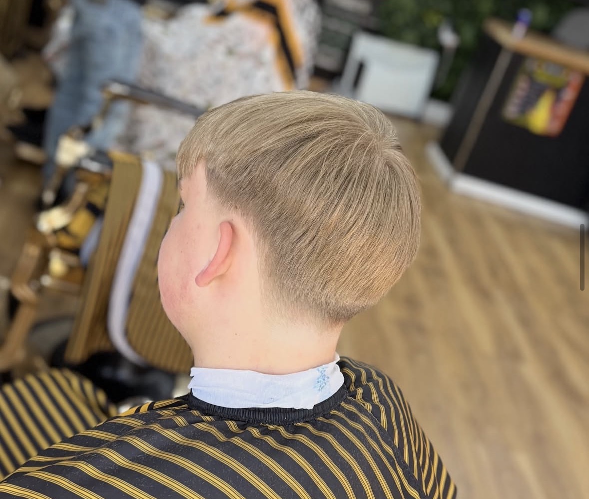 Clean blonde crop finished from the back
